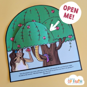 Photo of a paper Bible craft based on Eve being tempted in the garden of Eden